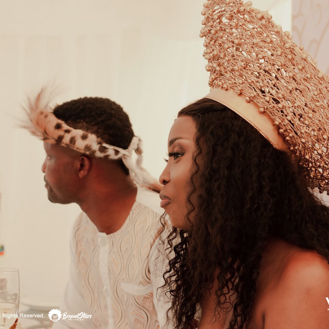 Couple in traditional attire during their ceremony